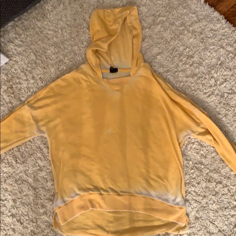 yellow sweater